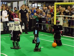 Learning to Improve Capture Steps for Disturbance Rejection in Humanoid Soccer