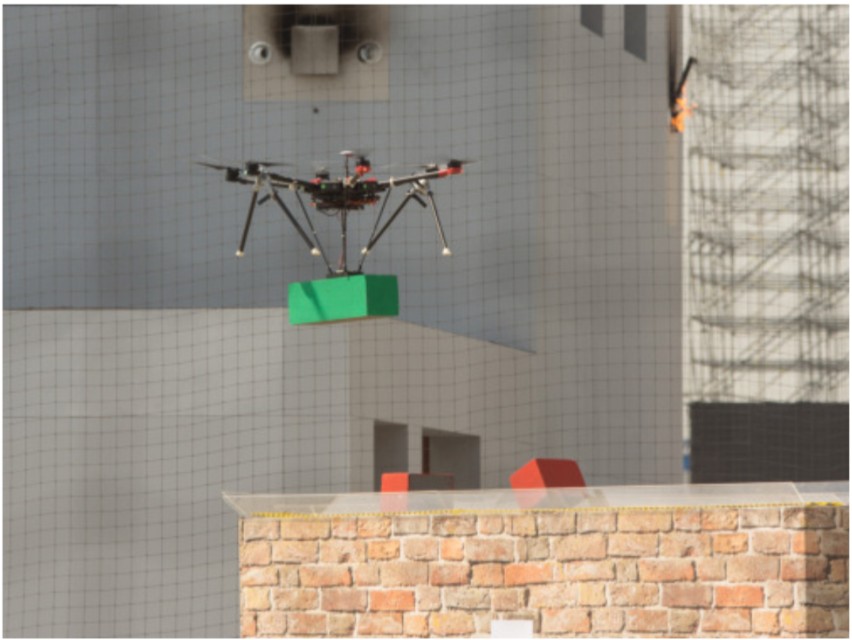 Autonomous Wall Building with a UGV-UAV Team at MBZIRC 2020